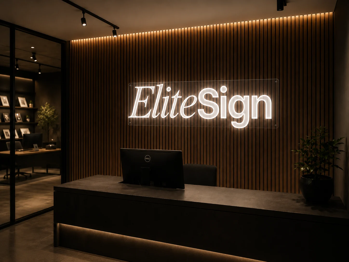 Illuminated Elite Sign logo on a slatted wood reception wall